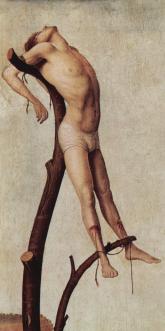 représentation d'une crucifixion contre un tronc d'arbre représentation d'une crucifixion contre un tronc d'arbre