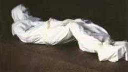 Le corps enveloppé dans un linceul Le corps enveloppé dans un linceul
